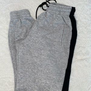 Grey joggers with black strip